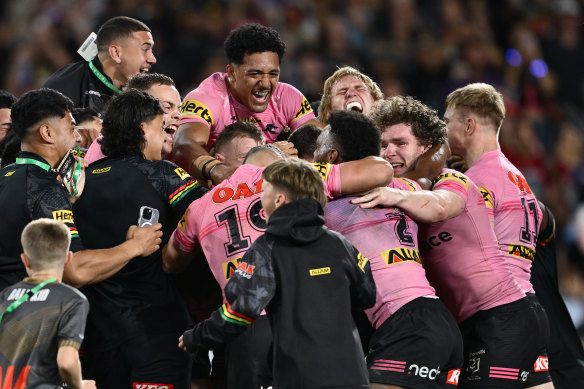 Panthers players celebrate victory over Melbourne.