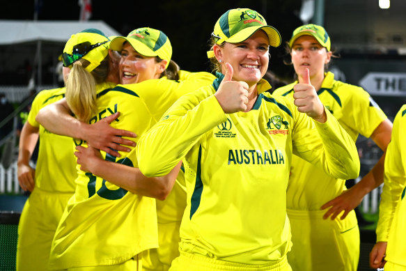 Jess Jonassen and the Australians celebrate winning the 2022 ICC Women’s Cricket World Cup Final.