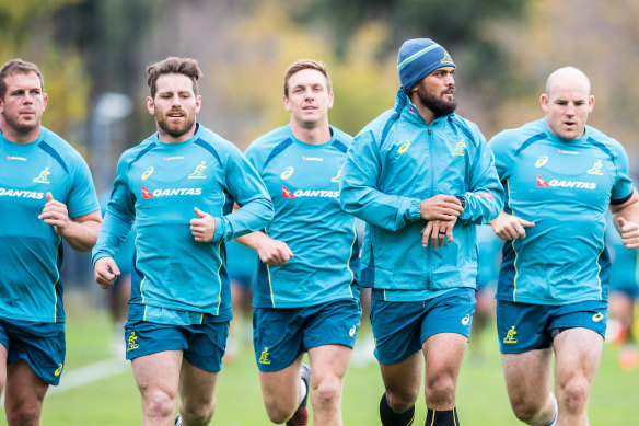 Toby Smith, far left, with former Wallabies teammates. 