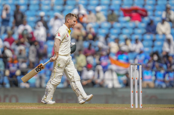 David Warner walks back to pavilion after his dismissal during the third day.