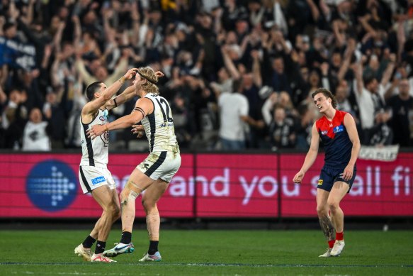 Sheer joy: The Blues react after the final siren.