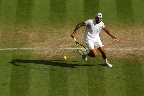 Nick Kyrgios plays a backhand against Cristian Garin of Chile.