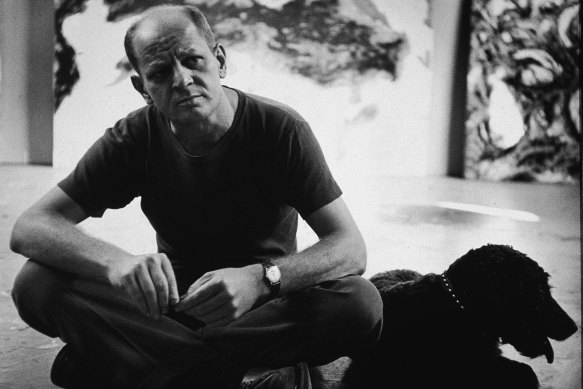 Jackson Pollock in his studio with his dog in 1953, the year after he painted ‘Blue Poles’.