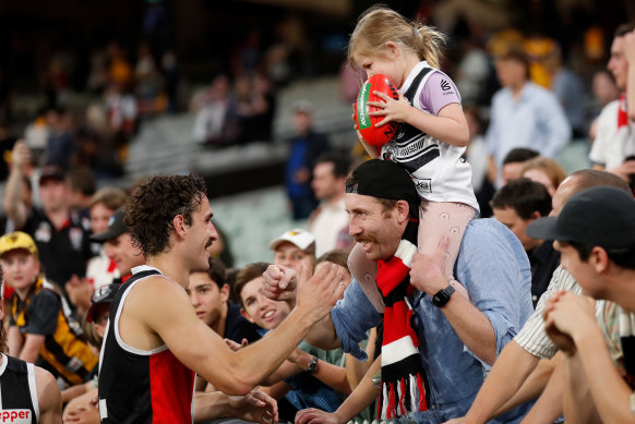 Max King celebrates with fans after St Kilda’s win over Hawthorn.