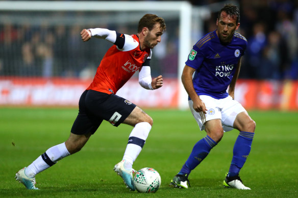 Callum McManaman (left) in action for Luton Town last year.