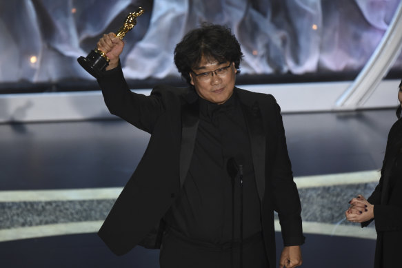 Bong Joon Ho accepts the Oscar for best international feature film for Parasite.