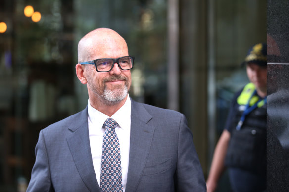 Former Victoria Police chief commissioner Simon Overland leaving the royal commission in December.