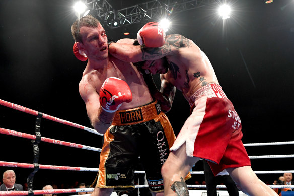 Jeff Horn and Michael Zerafa trade blows during their rematch in Brisbane.