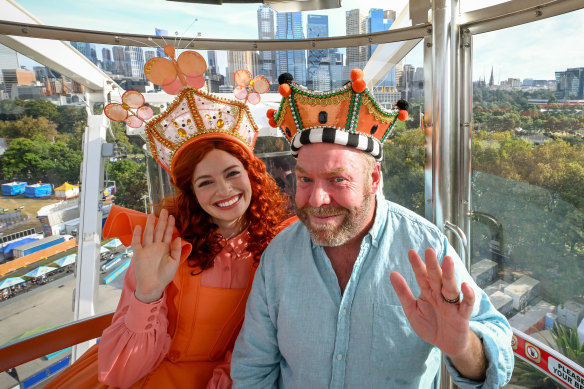 Farewell, subjects: This year’s Moomba monarchs, Emma Memma and Peter Helliar, on the big ferris wheel on Monday.