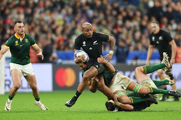 Mark Tele’a is tackled by Eben Etzebeth