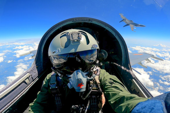 In this photo released by Xinhua News Agency, a Chinese fighter jet pilot takes part in military drills around Taiwan last weekend.