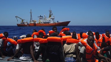 File photo of migrants aboard a dinghy in the Mediterranean Sea in 2016.