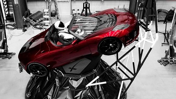 A mannequin “Starman” sits at the wheel of a Tesla Roadster which was sent into space.