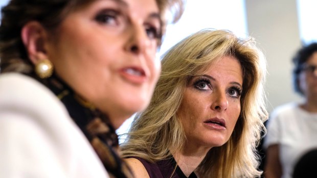 Summer Zervos, right, listens alongside her attorney Gloria Allred during a news conference in Los Angeles last October.