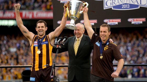Kennedy with 2013 premiership coach Alastair Clarkson and skipper Luke Hodge.