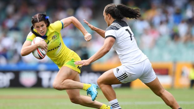 Speedy: Charlotte Caslick on the fly against New Zealand during the Sydney Sevens.