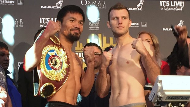 Game face: Manny Pacquiao and Jeff Horn after weighing in at Suncorp Stadium before Sunday's fight.