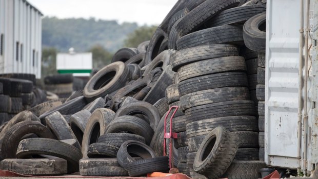 The piles of tyres at the Rocklea site, which the Department of Environment and Heritage Protection had raised concerns about before the fire in June.