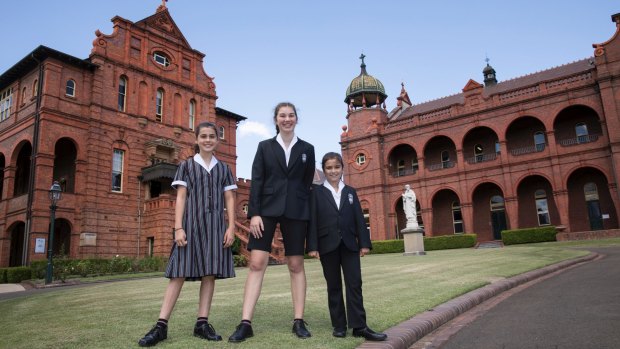 Santa Sabina College students Matilda Ball, Grace Campbell and Sophie Graham sport the new uniforms.