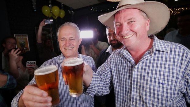 Prime Minister Malcolm Turnbull and Deputy Prime Minister celebrate on the night of the December 2 byelection.