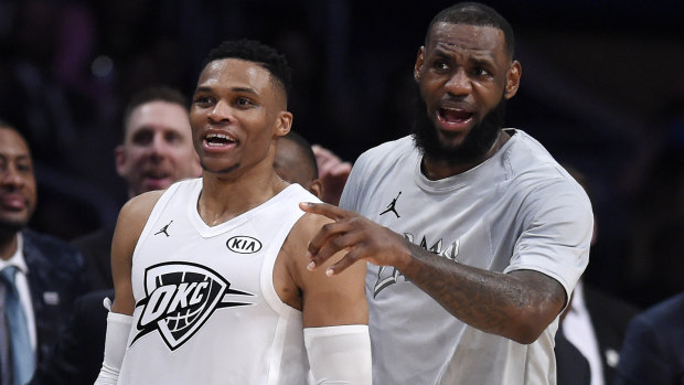 LeBron James and Russell Westbrook enjoy the show.