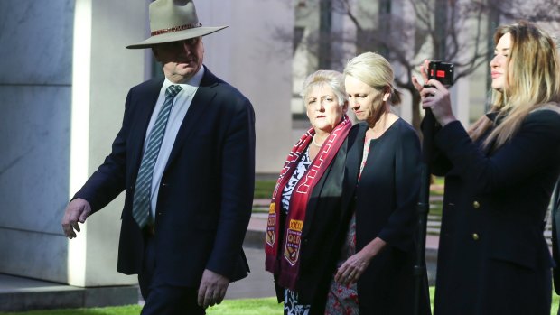  Deputy Prime Minister and Minister for Infrastructure and Transport Barnaby Joyce (left) and his media adviser Vikki Campion (right) seen arriving for a press conference last June.
