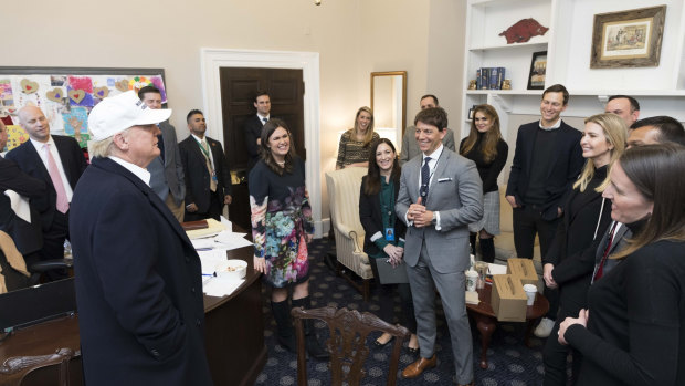 President Donald J. Trump meets with White House senior staff members Sarah Huckabee Sanders, Marc Short, Hope Hicks, Jessica Ditto, Hogan Gidley, Dan Scavino, Raj Shah, Jared Kushner, Ivanka Trump, Rob Porter, Mick Mulvaney and Lindsay Walters, in the West Wing communication offices, on the one year anniversary of President Trump’s inauguration on 20 January 2018.