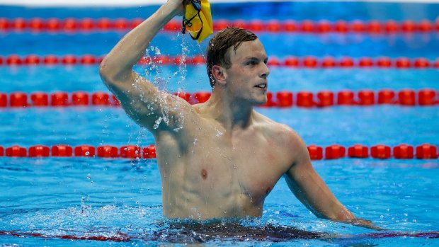No name no longer: Kyle Chalmers celebrates his gold medal in the 100m freestyle final in Rio.