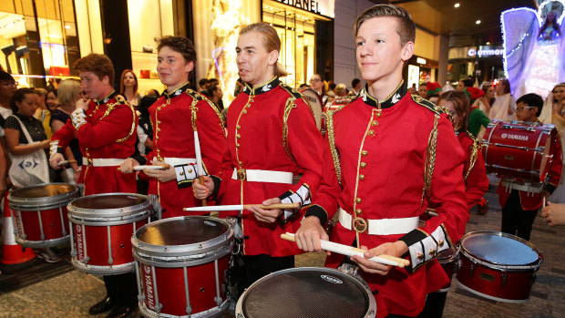 The drummer boys announce the arrival of the Christmas Parade in Queen Street Mall.