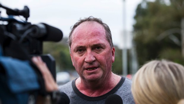 Former deputy prime minister Barnaby Joyce talks to reporters this week after playing rugby with colleagues.