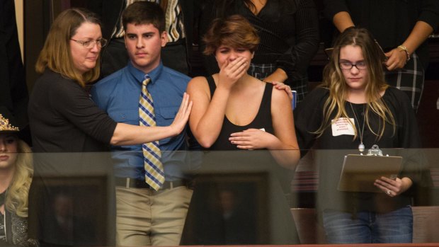 Sheryl Acquarola, a 16 year-old junior from Marjory Stoneman Douglas High School is overcome with emotion as she watches the Florida House of Representatives vote not to hear a bill banning assault rifles.