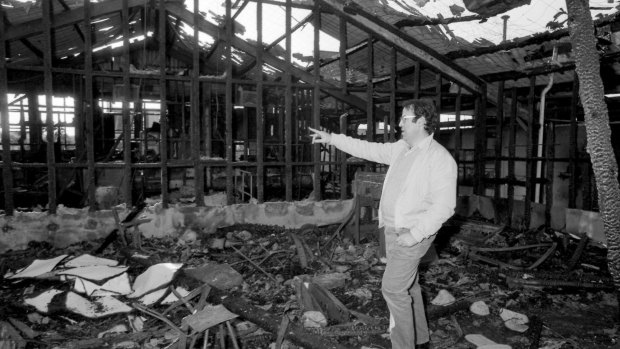Eddie Obeid, then managing director of Media Publishing, looks over the remains of his newspaper building that was fire-bombed on Saturday night, July 11, 1983.  