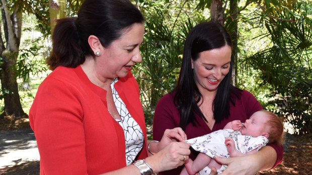 Queensland Premier Annastacia Palaszczuk with member for Keppel Brittany Lauga (right) and her new born baby girl, Odette, on the campaign trail, 