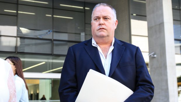 Alleged whistleblower cop Rick Flori leaves the Brisbane Supreme Court.