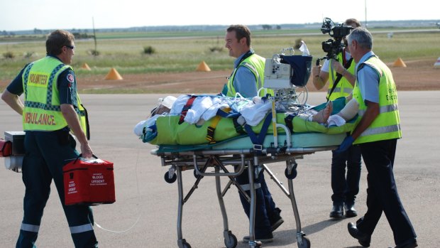 Sean Pollard is flown to Perth for emergency surgery after the shark attack.