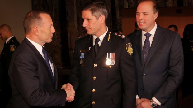 Roman Quaedvlieg at his Border Force swearing-in ceremony with then immigration minister Peter Dutton and prime minister Tony Abbott.