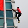 Rock climber Alex Honnold performs a free solo climb of the Taipei 101 skyscraper.