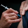 Older Australians told to book COVID-19 booster with flu shot amid immunity concerns