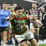 Rabbitohs Jacob Gagai runs at Sea Eagles Ben Trbojevic, right, during the opening match of the NRL between the Manly Warringah Sea Eagles and the South Sydney Rabbitohs at Allegiant Stadium in Las Vegas, Saturday, March 2, 2024. (AP Photo/David Becker)