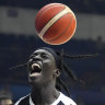 South Sudan centre Deng Acuoth scores against Angola at the FIBA World Cup and celebrates his country’s progression to the Olympics.