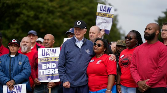 Joe Biden stands with striking autoworkers.
