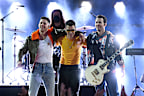 Nick Jonas, Joe Jonas, and Kevin Jonas of Jonas Brothers performing in 2021.