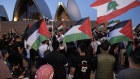 Palestinian supporters gathered outside the Opera House on October 9 after it was lit up in Israeli colours following the Hamas attack.