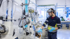 A worker operates a machine at the NorthVolt Labs research and development centre in Vasteras, Sweden.