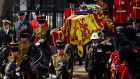 The Queen’s coffin makes its journey to Westminster Hall in London on September 14. 