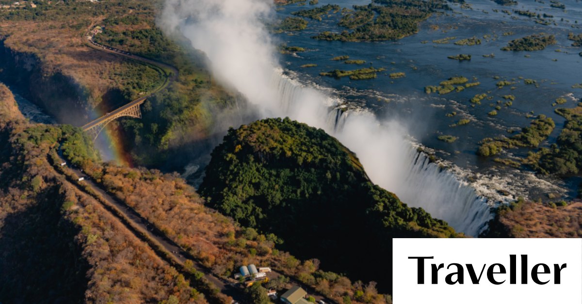 Zimbabwe. Victoria Falls. Steam train. Man looking out of window