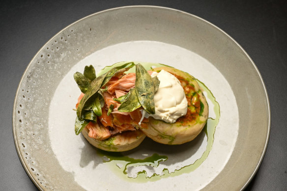 Crumpets with hot-smoked salmon, creme fraiche and crispy saltbush.