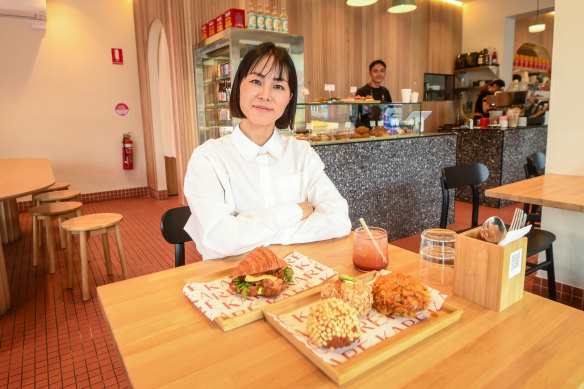 Kare Cafe co-owner Akiko Asano with some of the cafe’s signature dishes.