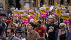 Protesters march against the far right outside the London offices of the Reform UK party.