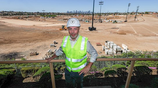 Moonee Valley Racing Club CEO Michael Browell above the home straight of the club’s new track.